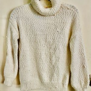 White turtleneck sweater